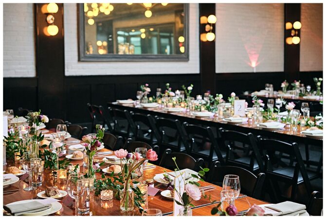 Elegant dining setup with flowers and candles.