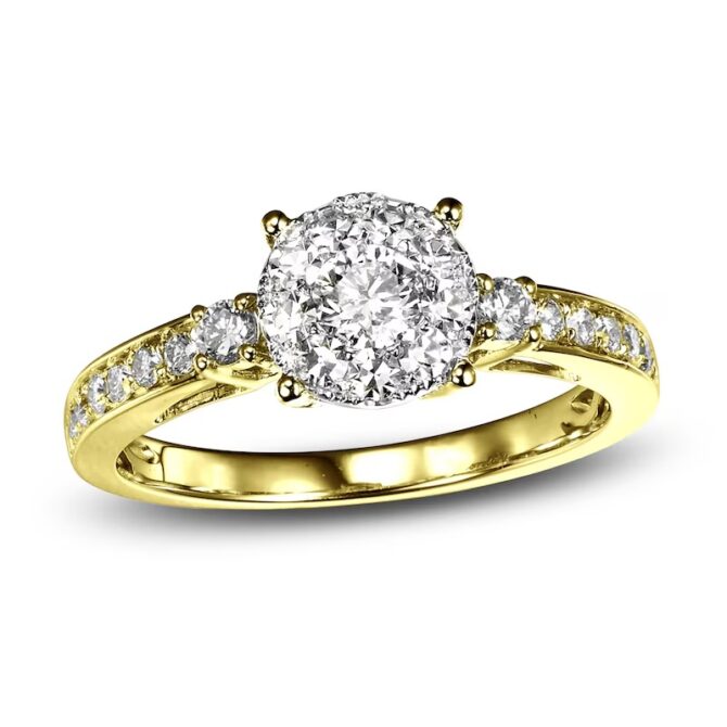 Gold ring with diamonds and round center stone.