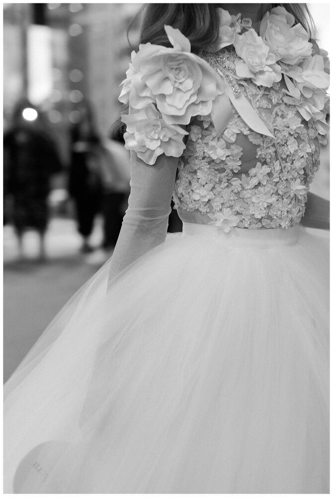 Elegant gown with floral details, black and white.