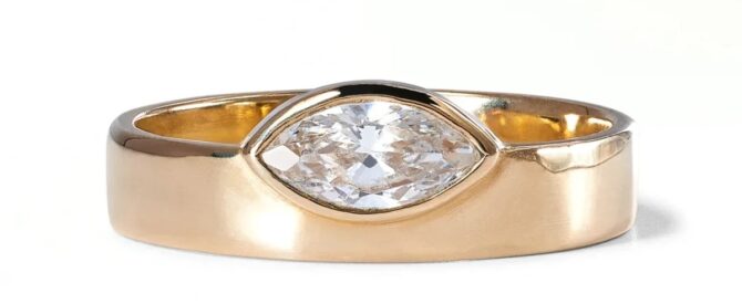 Gold ring with marquise-cut diamond