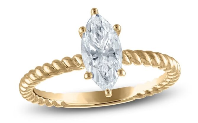 Gold ring with marquise diamond solitaire