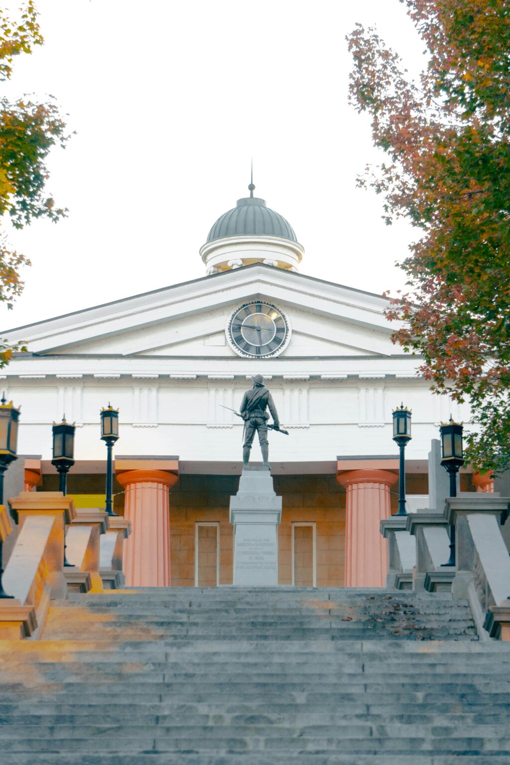 Historic courthouse with soldier statue on stairs Virginia