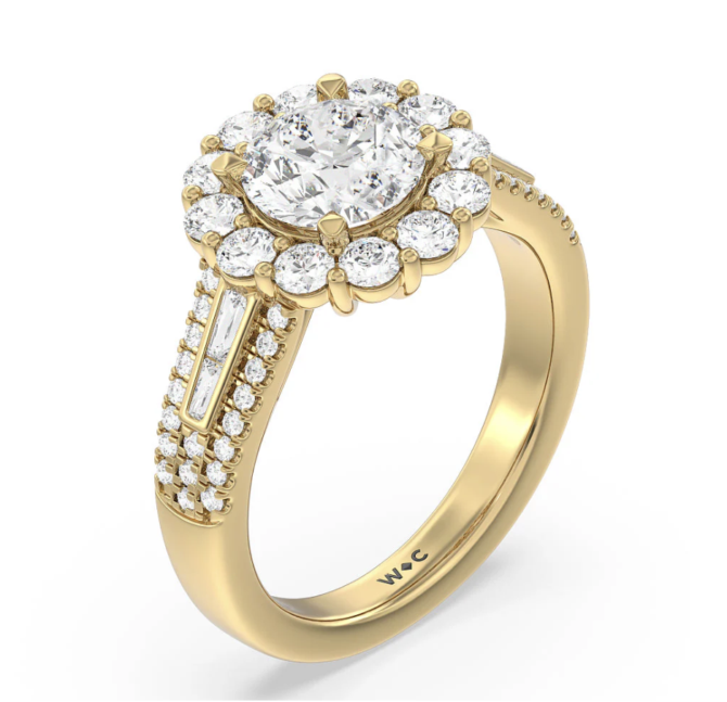 Gold engagement ring with diamond halo.